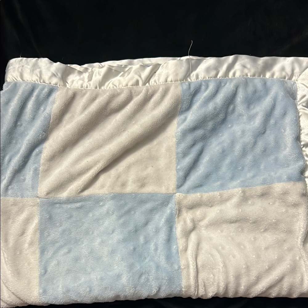 Blue and White Quilted Blanket